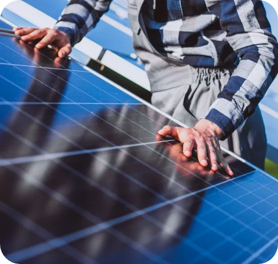 man worker field by solar panels
