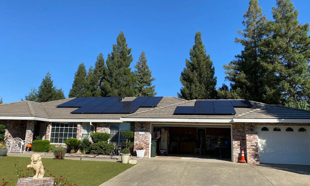 a house with solar panels on the roof a house with solar panels on the roof