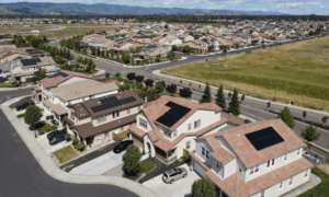 a aerial view of a neighborhood with solar